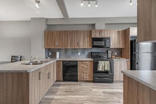 Photo 10: 94 New Brighton Landing SE in Calgary: New Brighton Row/Townhouse for sale : MLS®# A2052508