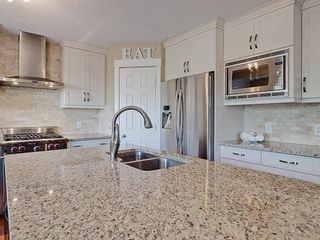 Photo 6: 54 BRIDLEPOST Green SW in Calgary: Bridlewood Detached for sale : MLS®# C4258811