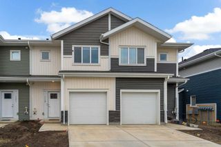 Photo 2: 119 137 Red Embers Link NE in Calgary: Redstone Row/Townhouse for sale : MLS®# A2130982