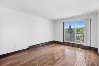 Photo 9: 405 1836 12 Avenue SW in Calgary: Sunalta Apartment for sale : MLS®# A2056442