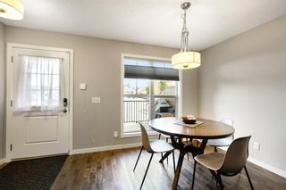 Photo 4: 731 101 Sunset Drive: Cochrane Row/Townhouse for sale : MLS®# A1245717