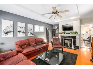 Photo 2: 2041 E 1ST Avenue in Vancouver: Grandview VE House for sale in "COMMERCIAL DRIVE" (Vancouver East)  : MLS®# V1079697