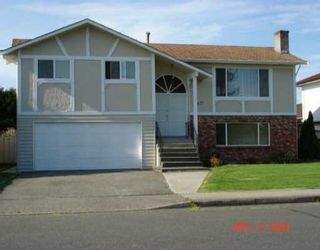 Photo 1: 11971 KINGFISHER Drive in Richmond: Westwind House for sale in "WESTWIND" : MLS®# V636498