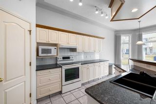 Photo 15: 15 Hamptons Bay NW in Calgary: Hamptons Semi Detached (Half Duplex) for sale : MLS®# A2129852