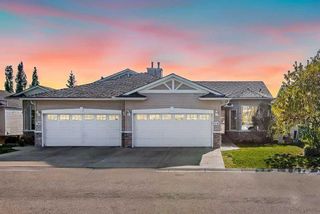 Main Photo: 116 Rocky Ridge Villas NW in Calgary: Rocky Ridge Semi Detached (Half Duplex) for sale : MLS®# A2082707