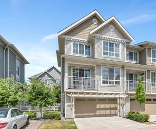 Photo 1: 47 5510 ADMIRAL Way in Ladner: Neilsen Grove Townhouse for sale in "Charterhouse" : MLS®# R2783312