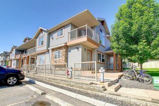 Photo 1: 205 70 Panatella Landing NW in Calgary: Panorama Hills Row/Townhouse for sale : MLS®# A1223952