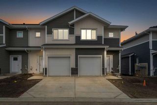 Photo 1: 119 137 Red Embers Link NE in Calgary: Redstone Row/Townhouse for sale : MLS®# A2130982
