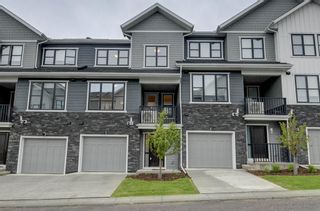 Photo 1: 507 Crestridge Common SW in Calgary: Crestmont Row/Townhouse for sale : MLS®# A1231684
