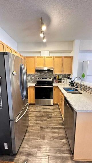 Photo 2: 3302 70 Panamount Drive NW in Calgary: Panorama Hills Apartment for sale : MLS®# A2128648