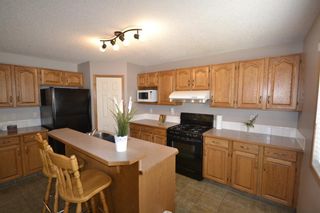 Photo 4: 202 Arbour Stone Rise NW in Calgary: Arbour Lake Detached for sale : MLS®# A1136884