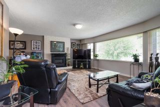 Photo 2: 20260 47A Avenue in Langley: Langley City House for sale in "Creekside" : MLS®# R2758716