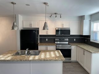 Main Photo: 202 1174 WINGTIP Place in Squamish: Downtown SQ Condo for sale in "Wingtip" : MLS®# R2888212