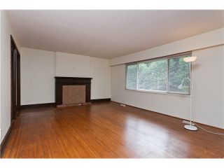 Photo 4: 2351 COMO LAKE Avenue in Coquitlam: Chineside House for sale : MLS®# V1022988
