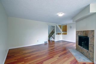 Photo 16: 130 Strathlorne Mews SW in Calgary: Strathcona Park Row/Townhouse for sale : MLS®# A1252004