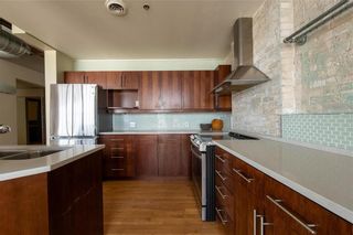 Photo 10: 402 110 Princess Street in Winnipeg: Exchange District Condominium for sale (9A)  : MLS®# 202408655