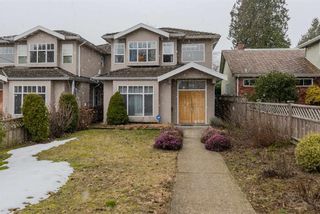 Photo 1: 7091 NELSON Avenue in Burnaby: Metrotown 1/2 Duplex for sale (Burnaby South)  : MLS®# R2345933