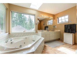 Photo 18: 11 CREEKSTONE Place in Port Moody: Heritage Mountain House for sale in "CREEKSTONE" : MLS®# R2686792