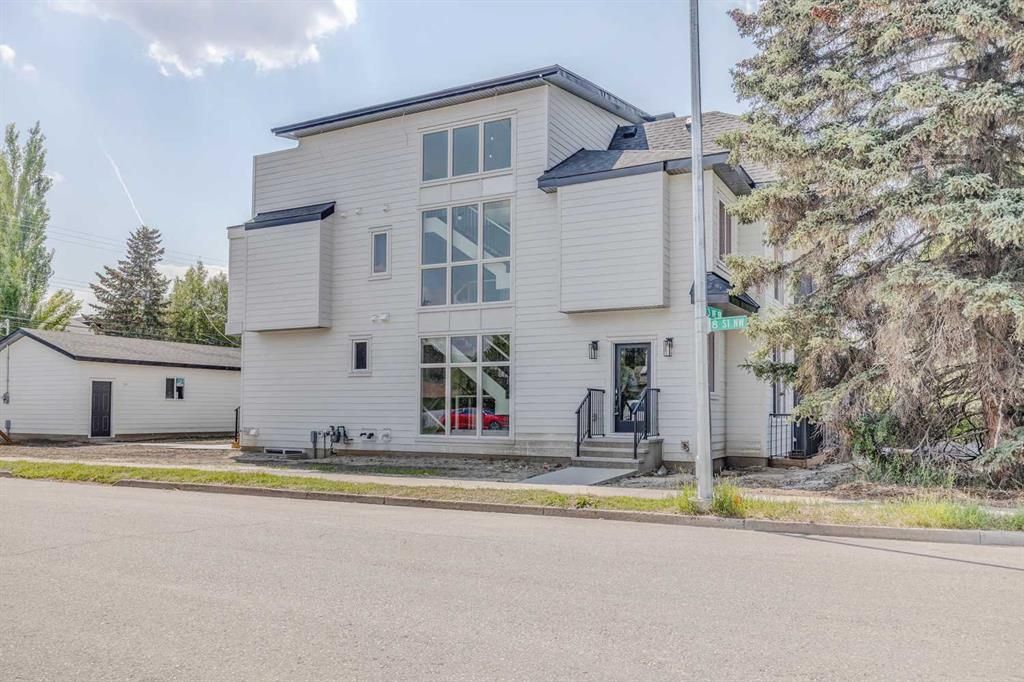 Main Photo: 2325 8 Street NW in Calgary: Mount Pleasant Semi Detached (Half Duplex) for sale : MLS®# A2061804