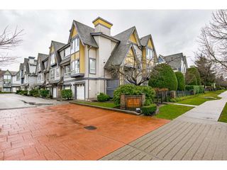 Photo 1: 62 16388 85 Avenue in Surrey: Fleetwood Tynehead Townhouse for sale in "Camelot Village" : MLS®# R2535217