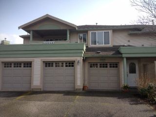 Photo 1: 112 13888 70TH Avenue in Surrey: East Newton Townhouse for sale in "Chelsea Gardens" : MLS®# F1305021