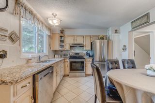 Photo 12: 108 Silvergrove Road NW in Calgary: Silver Springs Semi Detached for sale : MLS®# A1226861