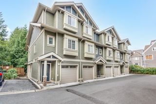Photo 1: 121 3382 VIEWMOUNT Drive in Port Moody: Port Moody Centre Townhouse for sale in "Lillium Villas" : MLS®# R2659052