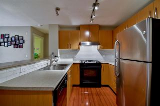 Photo 5: 201 400 KLAHANIE Drive in Port Moody: Port Moody Centre Condo for sale in "TIDES" : MLS®# R2130568