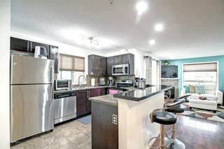 Photo 10: 1325 60 Panatella Street NW in Calgary: Panorama Hills Apartment for sale : MLS®# A1163274