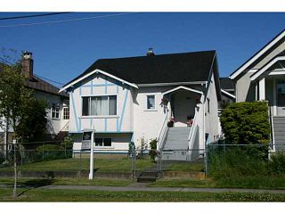Photo 1: 4184 INVERNESS Street in Vancouver: Knight House for sale (Vancouver East)  : MLS®# V1075434