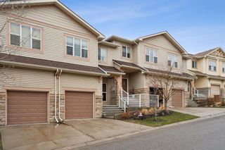 Photo 4: 295 Sunset Point: Cochrane Row/Townhouse for sale : MLS®# A2127381
