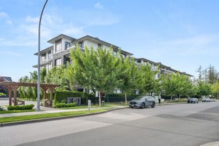 Photo 1: 210 22087 49 Avenue in Langley: Murrayville Condo for sale in "The Belmont" : MLS®# R2883810