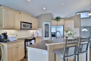 Photo 13: 12 Strathridge Way SW in Calgary: Strathcona Park Detached for sale : MLS®# A2046710