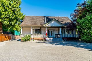 Photo 2: 4174 200 Street in Langley: Brookswood Langley House for sale in "Brookswood" : MLS®# R2711387