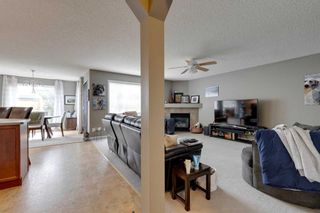 Photo 9: 35 Cougarstone Landing SW in Calgary: Cougar Ridge Detached for sale : MLS®# A2063797