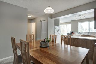 Photo 8: 143 Woodvale Bay SW in Calgary: Woodlands Row/Townhouse for sale : MLS®# A2022754