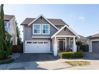 Photo 1: 7089 179 Street in Surrey: Cloverdale BC House for sale in "Provinceton" (Cloverdale)  : MLS®# R2492815
