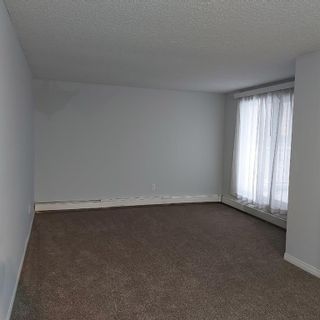 Photo 4: 107 431 1 Avenue NE Calgary Home For Sale