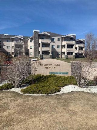 Main Photo: 102 26 Country Hills View NW in Calgary: Country Hills Apartment for sale : MLS®# A2124237