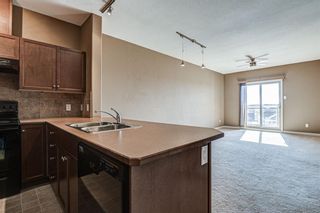 Photo 6: 1407 92 CRYSTAL SHORES Road: Okotoks Apartment for sale : MLS®# A1222250