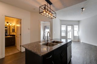 Photo 4: 4116 5605 Henwood Street SW in Calgary: Garrison Green Apartment for sale : MLS®# A2077452
