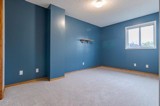 Photo 11: 115 Mt Aberdeen Manor SE in Calgary: McKenzie Lake Row/Townhouse for sale : MLS®# A1147019