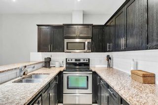 Photo 11: 304 117 19 Avenue NE in Calgary: Tuxedo Park Apartment for sale : MLS®# A2130812