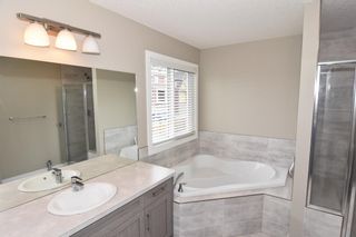 Photo 19: 215 Kinniburgh Road: Chestermere Semi Detached for sale : MLS®# A1237068