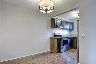 Photo 7: 161 7172 Coach Hill Road SW in Calgary: Coach Hill Row/Townhouse for sale : MLS®# A1101554
