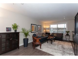 Photo 5: 202 19936 56 Avenue in Langley: Langley City Condo for sale in "BEARING POINTE" : MLS®# R2240895