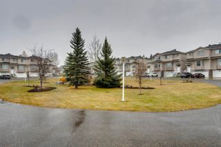 Photo 38: 128 Country Hills Gardens NW in Calgary: Country Hills Row/Townhouse for sale : MLS®# A1157775