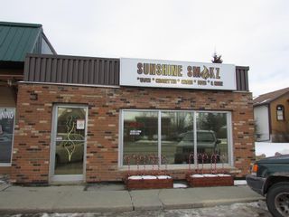 Photo 1: 116 Centre Street N: Sundre Mixed Use for sale : MLS®# A2023549