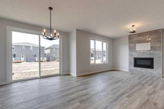 Photo 6: 82 Hotchkiss Manor SE in Calgary: C-385 Detached for sale : MLS®# A2101092