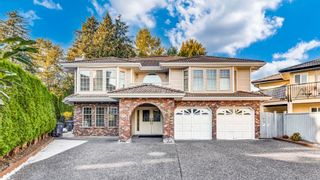 Photo 1: 7098 122A Street in Surrey: West Newton House for sale : MLS®# R2731572